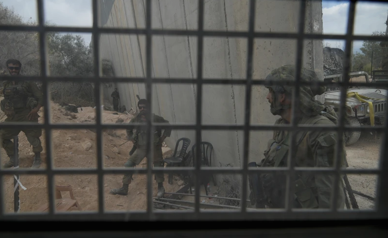Israeli soldiers are seen during a ground operation in southern Lebanon, near the border with Israel, Sunday, Oct. 13, 2024